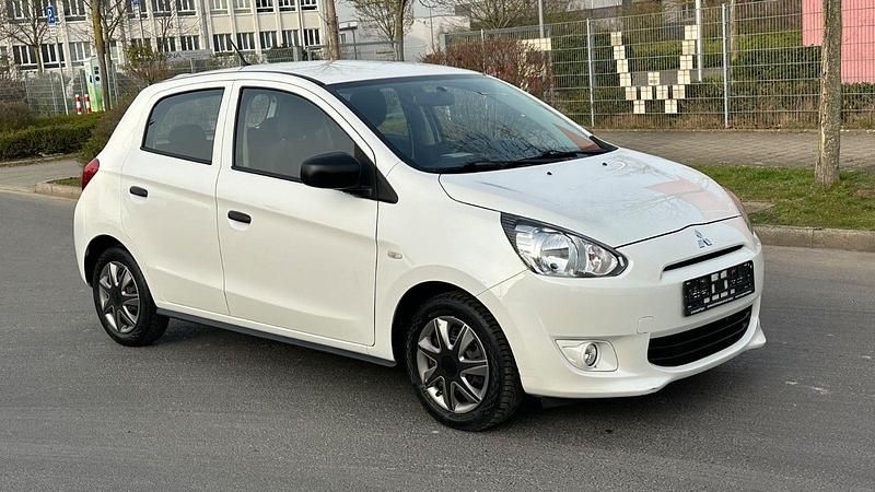 Gebraucht Mitsubishi Space Star Diamant Edition 71 PS (52 kW) 2015 Weiß Kleinwagen