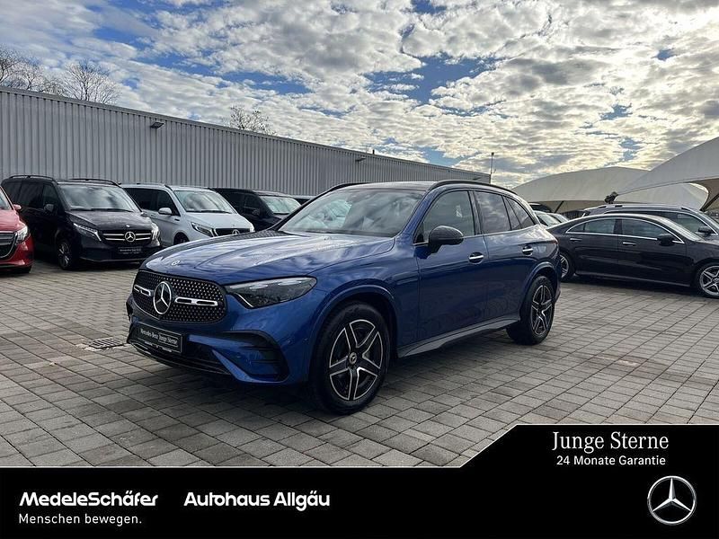 Lack spektralblau Gebraucht 2023 Mercedes GLC220 AMG SUV | 54.770 € (Etwas zu teuer) - Bild 1/4