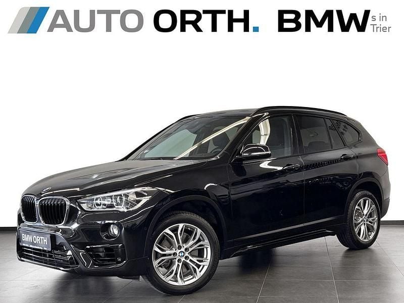 Saphirschwarz Gebraucht 2018 BMW X1 Sport Line SUV | 26.800 € (Fairer Preis) - Bild 1/4