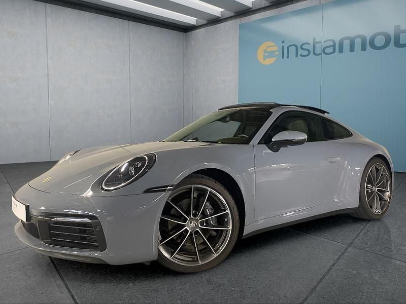 Grau Gebraucht 2024 Porsche 911 Carrera Coupé | 133.899 € (Teuer) - Bild 1/4