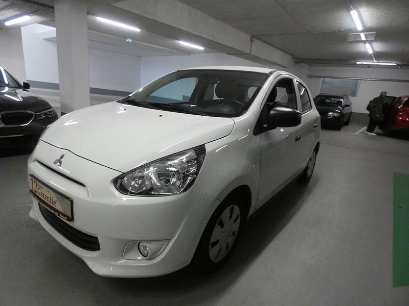 Weiß Gebraucht 2014 Mitsubishi Space Star Kleinwagen | 4.600 € (Fairer Preis) - Bild 1/4
