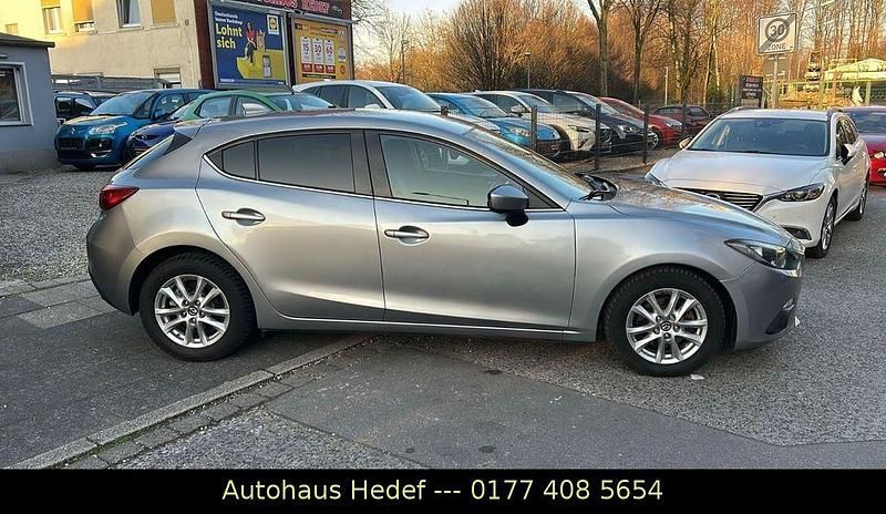 Grau Gebraucht 2014 Mazda 3 Center-Line Limousine | 8.990 € (Guter Preis) - Bild 1/4