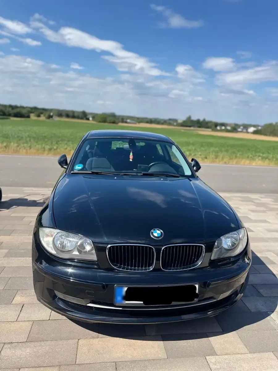 Gebraucht BMW 116 122 PS (89 kW) 2009 Schwarz Kleinwagen
