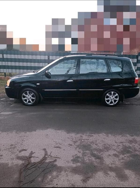 Schwarz Gebraucht 2006 Kia Carens EX Van / Kleinbus | 2.950 € - Bild 1/4