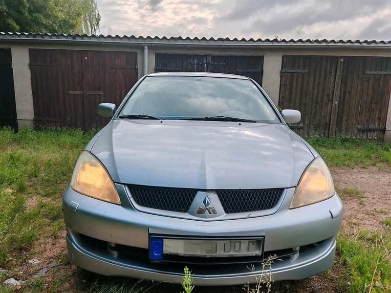 Grau Gebraucht 2006 Mitsubishi Lancer Kombi | 300 € - Bild 1/4