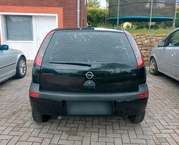Second-hand Opel Corsa 75 CP (55 kW) 2002 Negru Hatchback