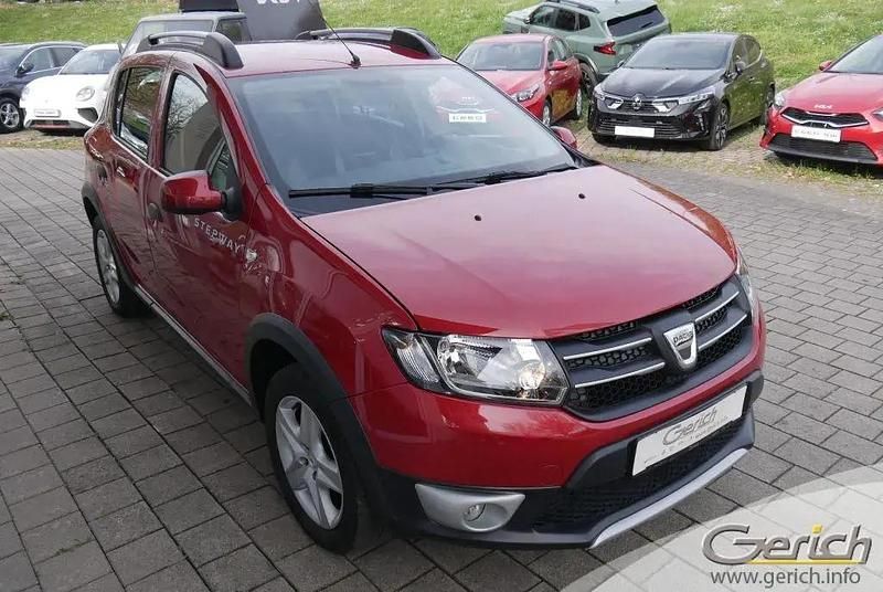 Gebraucht Dacia Sandero Prestige 90 PS (66 kW) 2015 Flammenrot metallic Kleinwagen