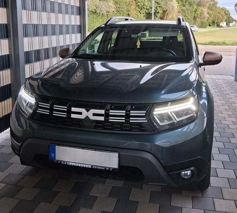Grün Gebraucht 2023 Dacia Duster Extreme SUV | 22.400 € (Fairer Preis) - Bild 1/4