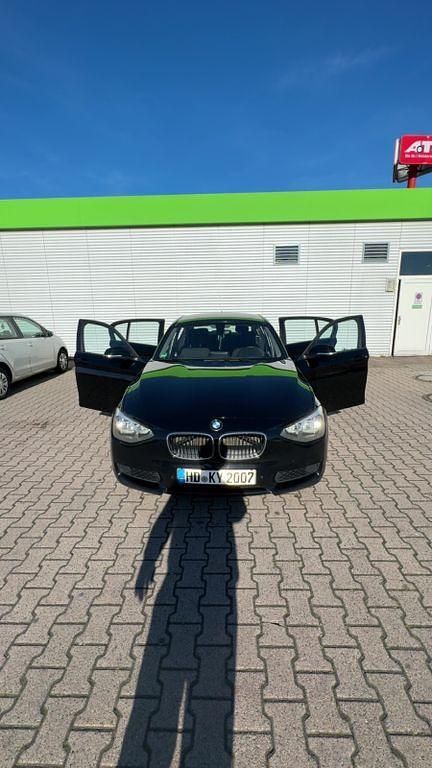 Second-hand BMW 116 Efficient Dynamics 116 CP (85 kW) 2013 Negru Hatchback