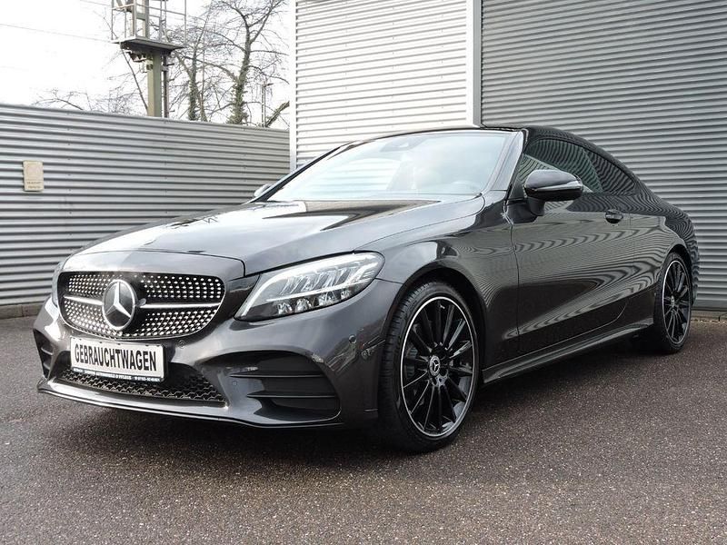 Grau Gebraucht 2021 Mercedes C200 AMG line Coupé | 34.900 € (Fairer Preis) - Bild 1/4