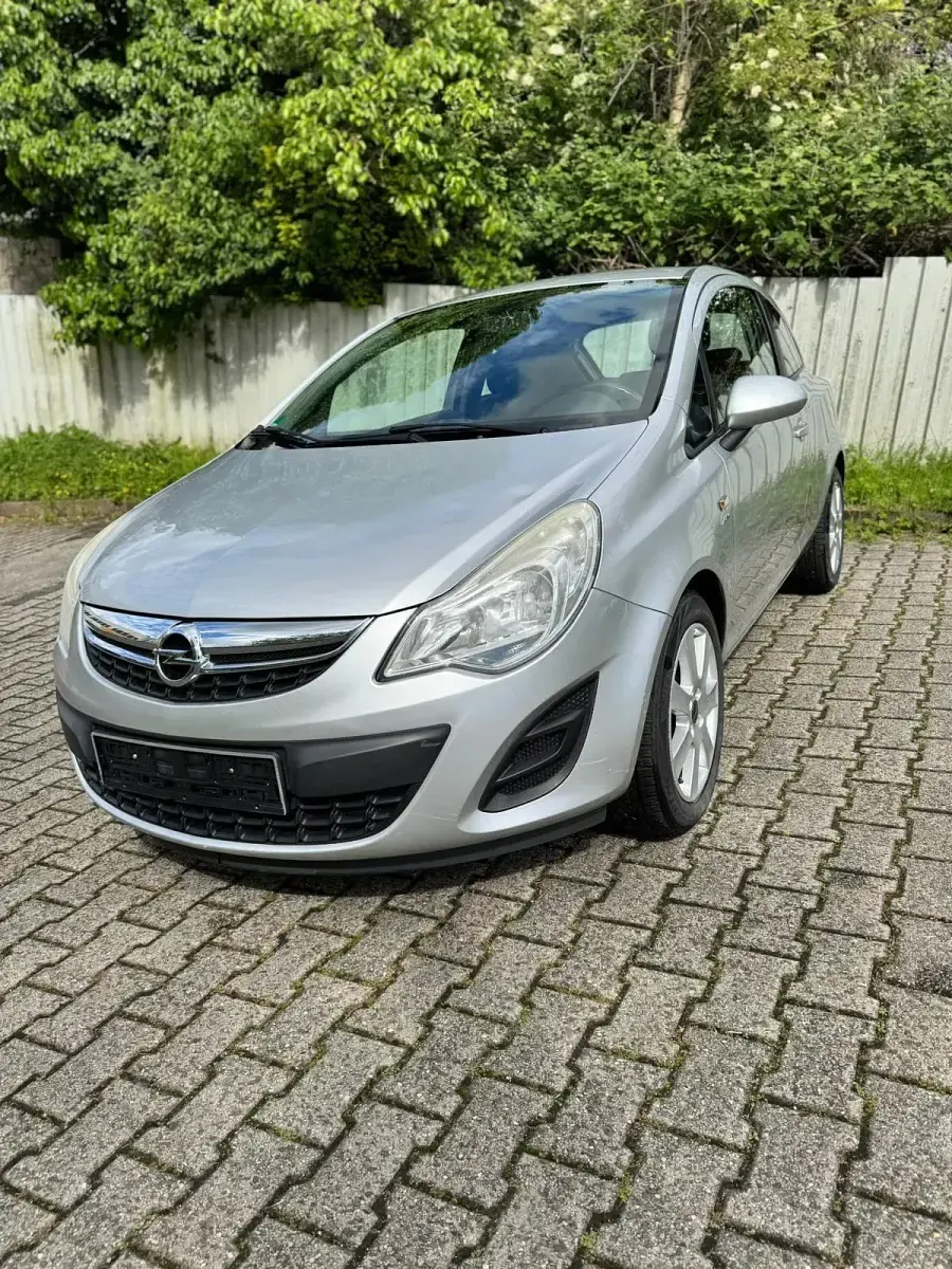 Gebraucht Opel Corsa 60 PS (44 kW) 2013 Silber Kleinwagen
