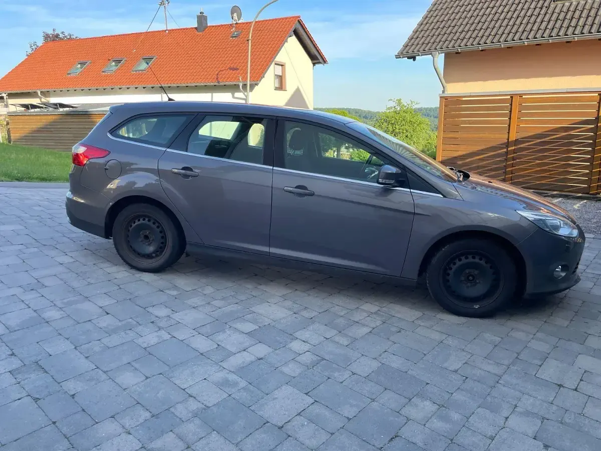 Gebraucht Ford Focus Titanium 116 PS (85 kW) 2014 Braun Kombi