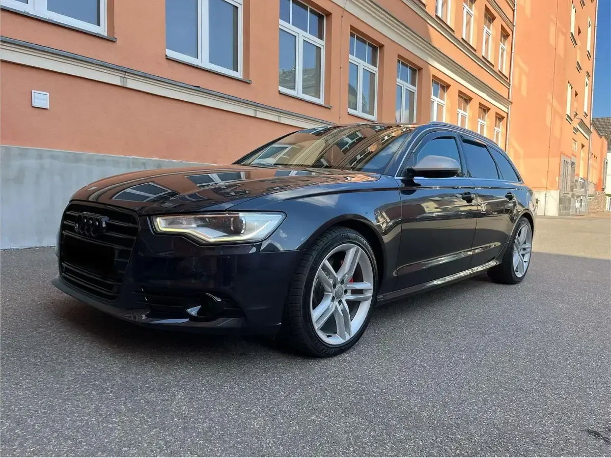 Używany Audi A6 Comfort 245 KM (180 kW) 2014 Niebieski Kombi