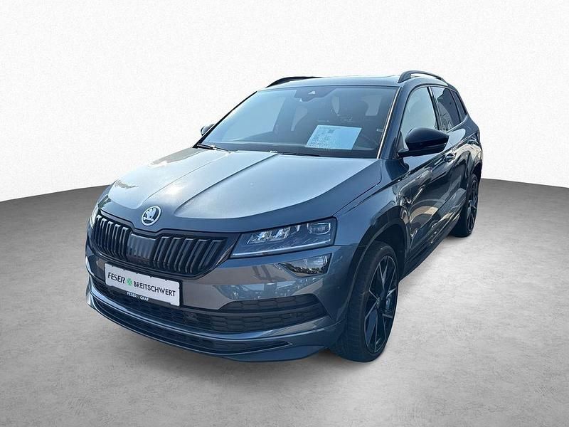 Quarz grau Gebraucht 2020 Skoda Karoq SportLine SUV | 25.950 € (Teuer) - Bild 1/4