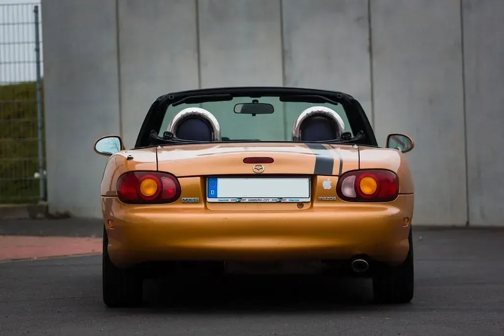 Gebraucht Mazda MX5 110 PS (80 kW) 1998 Orange Cabrio