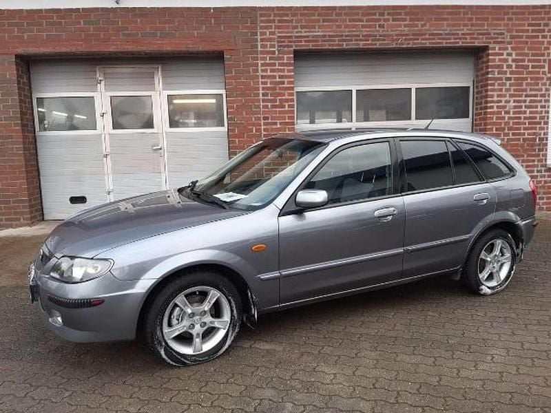 Gebraucht Mazda 323 98 PS (72 kW) 2003 Titaniumgrey metallic (25g) Limousine