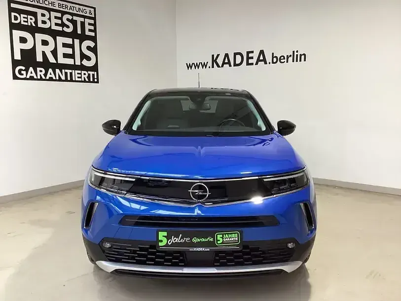 Gebraucht Opel Mokka 101 PS (74 kW) 2023 Perl blau/voltaik blau (metallic) SUV