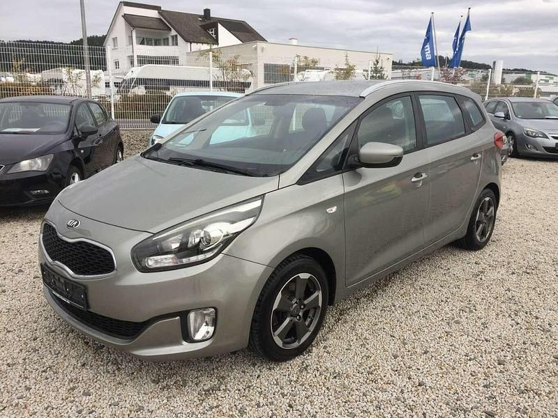 Bronze Gebraucht 2015 Kia Carens DREAM-TEAM Edition Van / Kleinbus | 5.750 € (Fairer Preis) - Bild 1/4