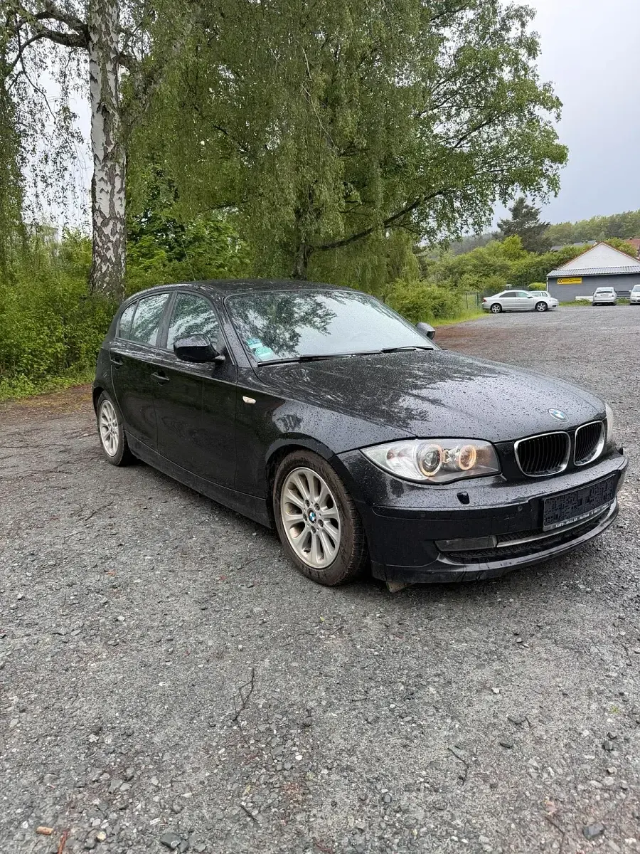 Second-hand BMW 116 116 CP (85 kW) 2009 Negru Hatchback