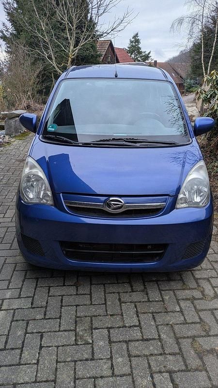Gebraucht Daihatsu Cuore 70 PS (51 kW) 2009 Blau Kleinwagen