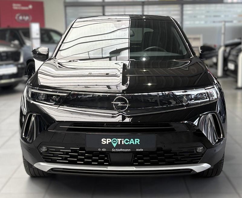 Gebraucht Opel Mokka-e Ultimate 100 kW (136 PS) 2021 Diamant schwarz/karbon schwarz SUV