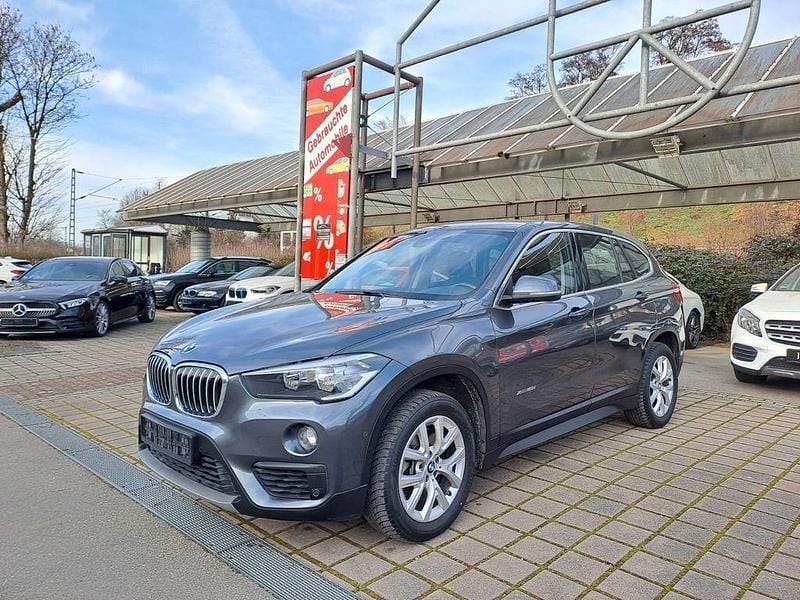 Grau Gebraucht 2016 BMW X1 Advantage SUV | 13.950 € (Superpreis) - Bild 1/4