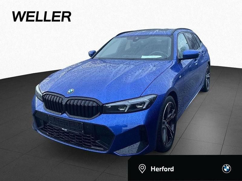 Portimao blau (blau) Gebraucht 2024 BMW 320 M Sport Kombi | 37.890 € (Guter Preis) - Bild 1/4