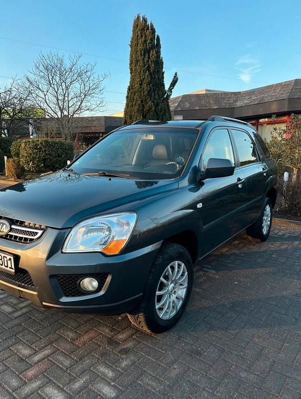 Grau Gebraucht 2010 Kia Sportage SUV | 5.300 € (Fairer Preis) - Bild 1/4