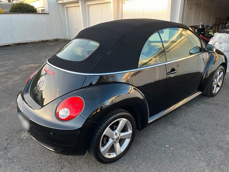 Gebraucht VW New Beetle 102 PS (75 kW) 2008 Schwarz Kleinwagen