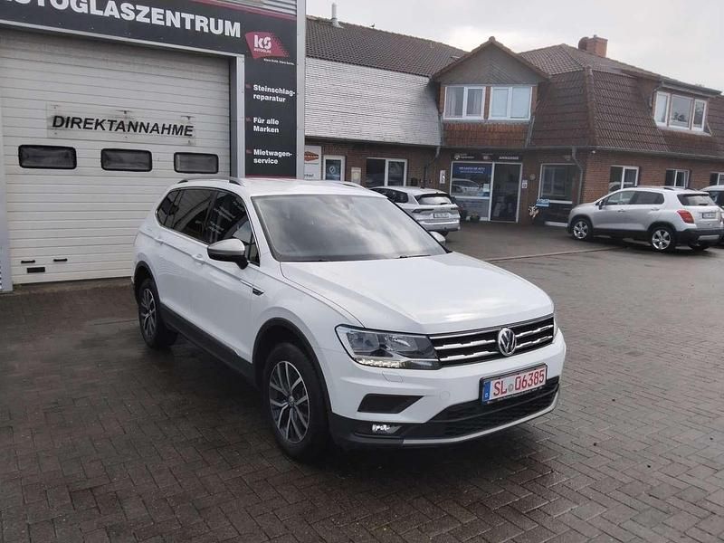 Pure white (weiß) Gebraucht 2020 VW Tiguan Allspace Comfortline SUV | 25.499 € (Fairer Preis) - Bild 1/4