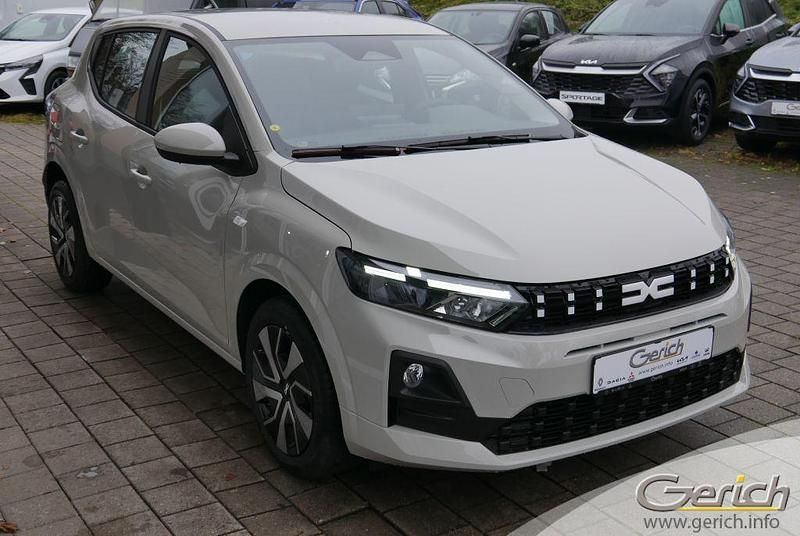 Neu Dacia Sandero Expression 101 PS (74 kW) 2026 Beige Limousine