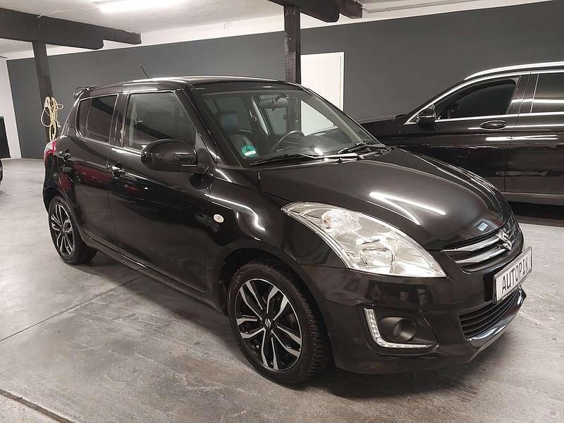 Schwarz Gebraucht 2015 Suzuki Swift Club Kleinwagen | 8.399 € (Fairer Preis) - Bild 1/4