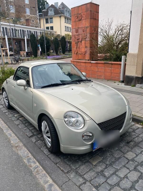 Gelb Gebraucht 2006 Daihatsu Copen Cabrio | 6.500 € - Bild 1/4