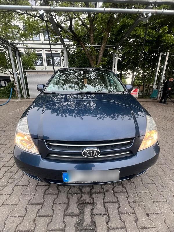 Blau Gebraucht 2006 Kia Carnival Van / Kleinbus | 7.500 € - Bild 1/4