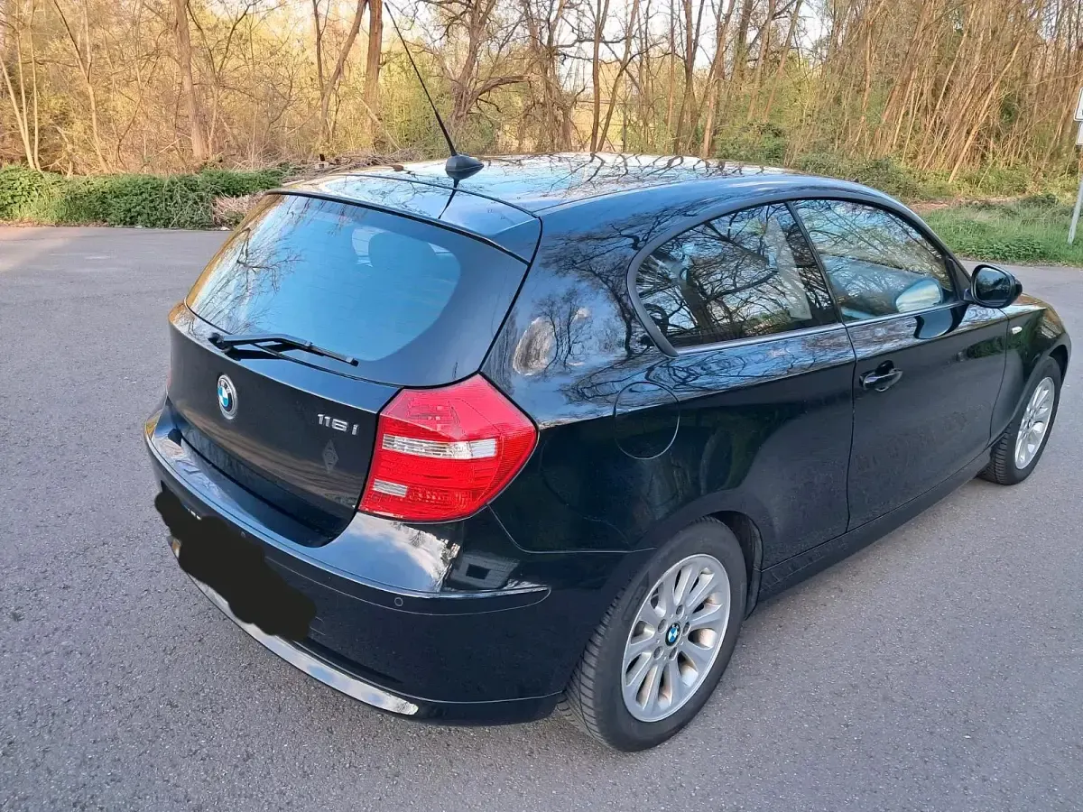 Używany BMW 116 125 KM (91 kW) 2010 Czarny Hatchback