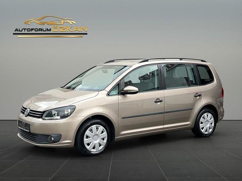 Beige Gebraucht 2012 VW Touran Trendline Van / Kleinbus | 5.499 € (Fairer Preis) - Bild 1/4