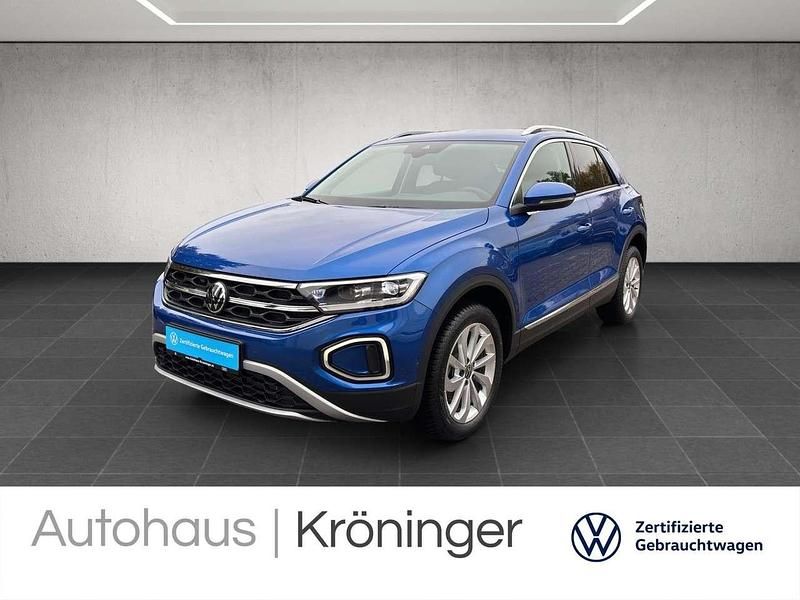 Ravennablau metallic Gebraucht 2024 VW T-Roc Style SUV | 29.990 € (Fairer Preis) - Bild 1/3