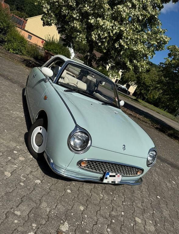 Blau Gebraucht 1991 Nissan Figaro Cabrio | 15.999 € - Bild 1/4