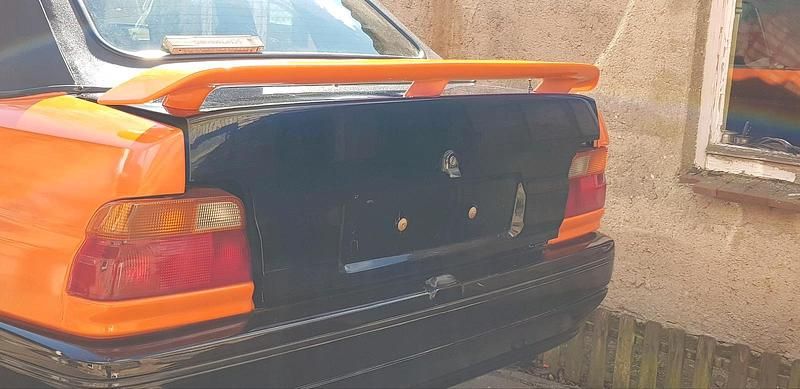 Gebraucht Ford Escort Cabriolet 131 PS (96 kW) 1991 Orange Cabrio