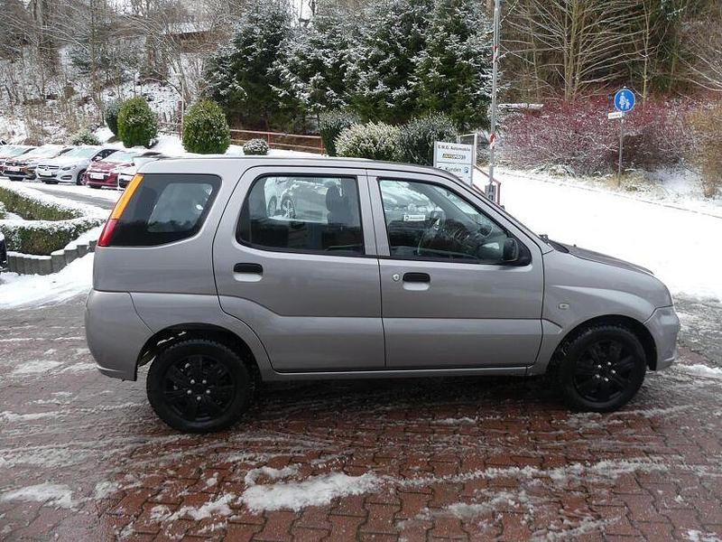 Gebraucht Subaru Justy 99 PS (72 kW) 2003 Grau Kleinwagen