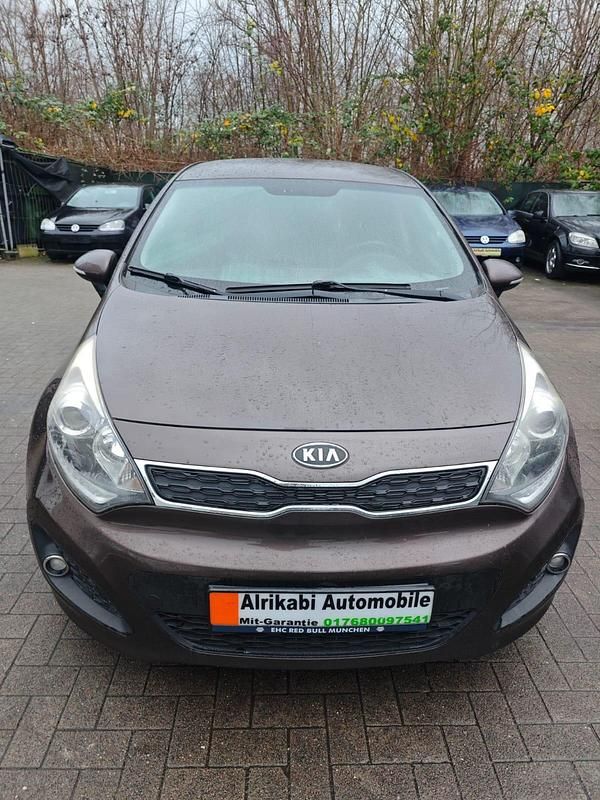 Braun Gebraucht 2012 Kia Rio Limousine | 4.600 € - Bild 1/4