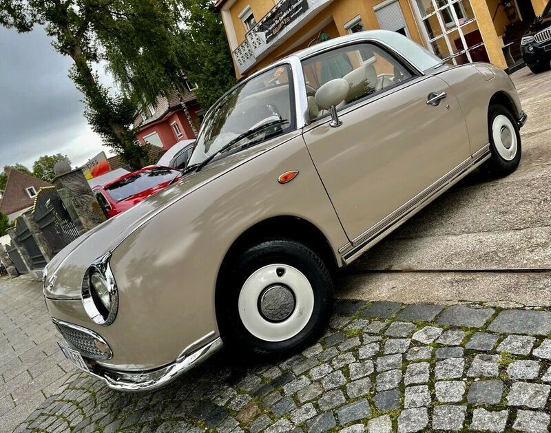 Grau Gebraucht 1991 Nissan Figaro Cabrio | 29.980 € - Bild 1/4