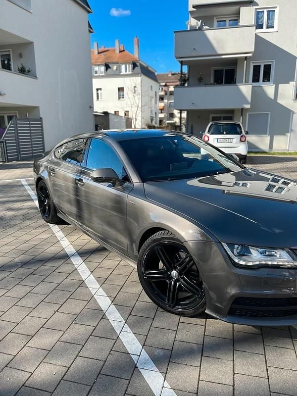 Grün Gebraucht 2013 Audi A7 Limousine | 12.699 € (Superpreis) - Bild 1/4