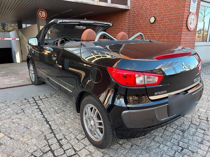 Second-hand Mitsubishi Colt 109 CP (80 kW) 2008 Negru Cabrio