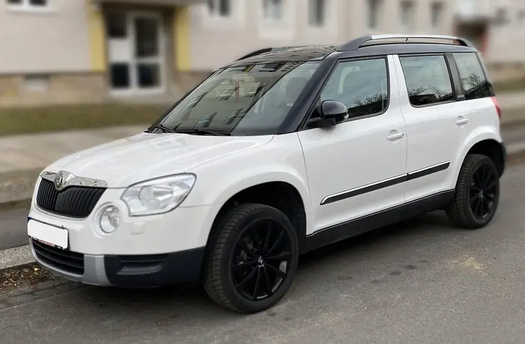 Gebraucht Skoda Yeti Adventure 122 PS (89 kW) 2013 Weiß SUV