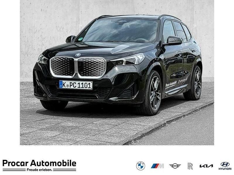 Schwarz Gebraucht 2025 BMW iX1 M Sport SUV | 45.490 € (Superpreis) - Bild 1/4