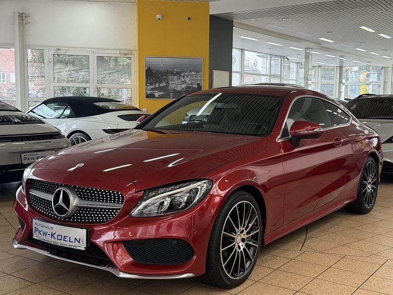 Hyazinthrot metallic (metallic) Gebraucht 2016 Mercedes C250 AMG line Coupé | 22.999 € (Fairer Preis) - Bild 1/4