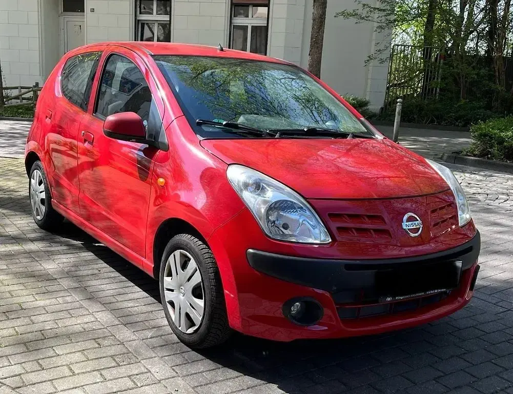 Gebraucht Nissan Pixo 68 PS (50 kW) 2009 Rot Kleinwagen