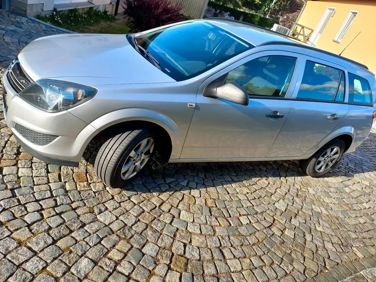 Gebraucht Opel Astra 90 PS (66 kW) 2010 Silber Kombi