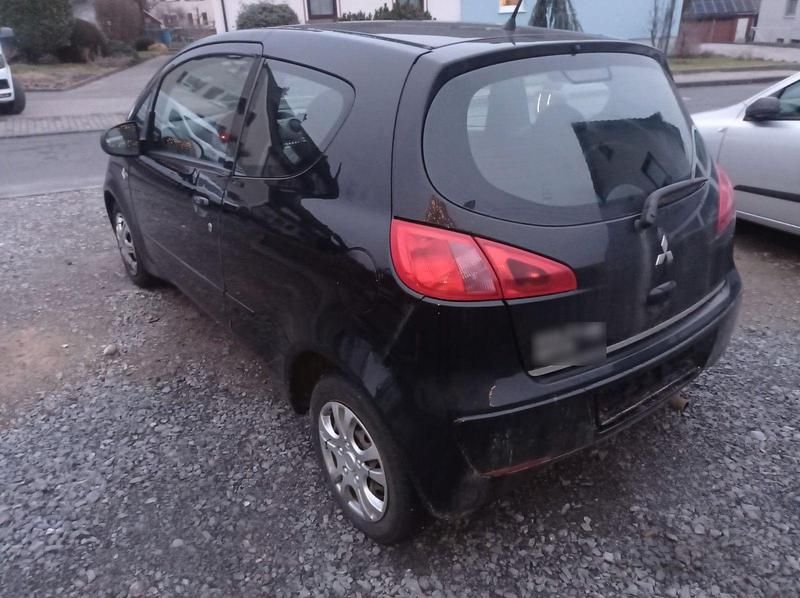Gebraucht Mitsubishi Colt Inform 75 PS (55 kW) 2006 Schwarz Kleinwagen